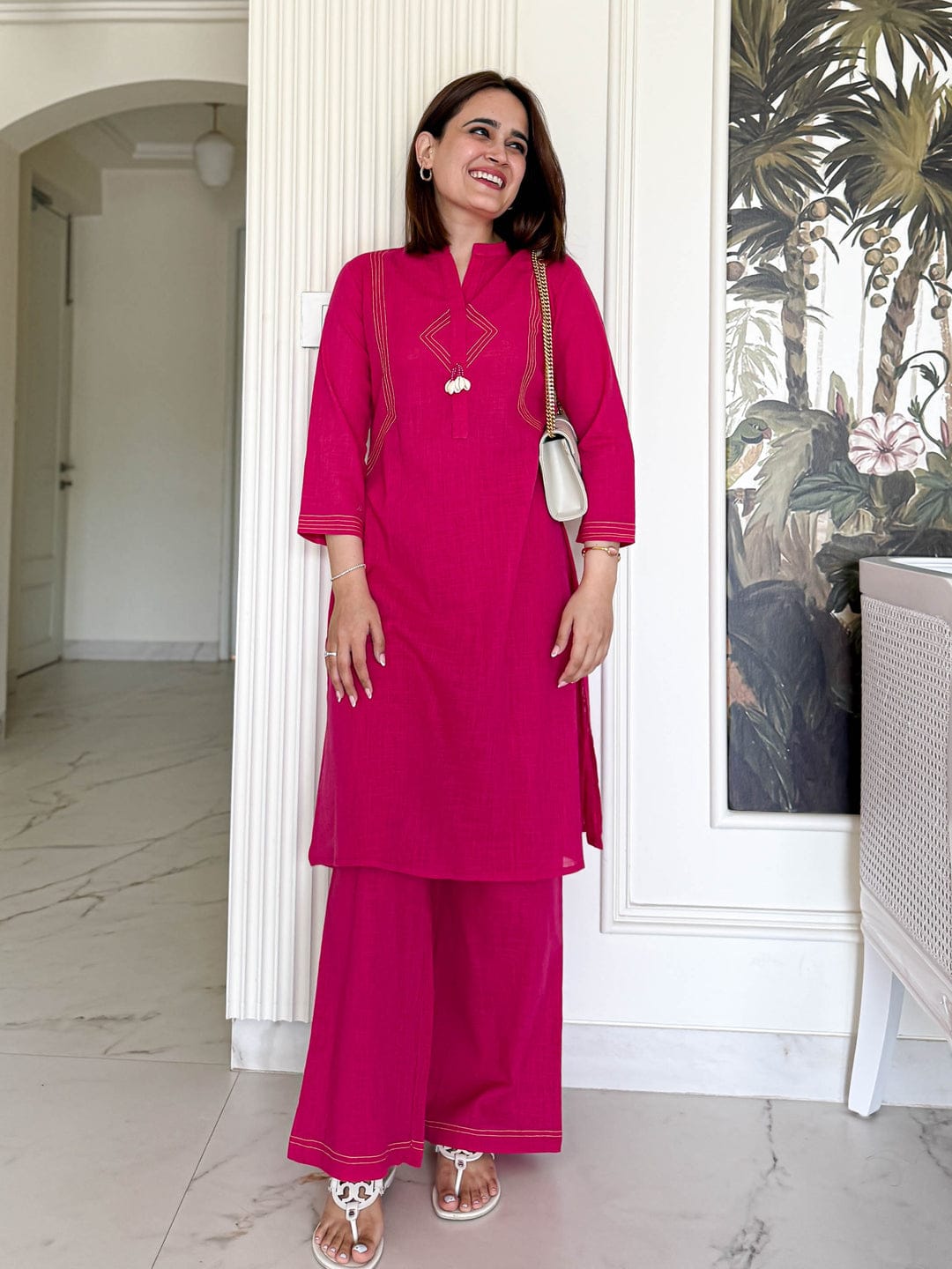 Pure cotton, clean lines, and just the right pop of pink Cord Set