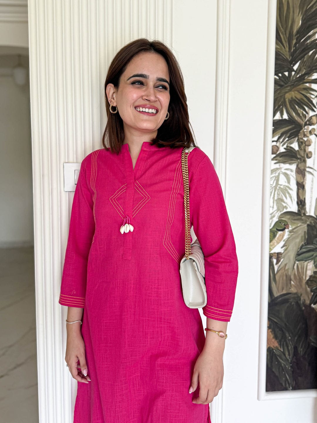 Pure cotton, clean lines, and just the right pop of pink Cord Set